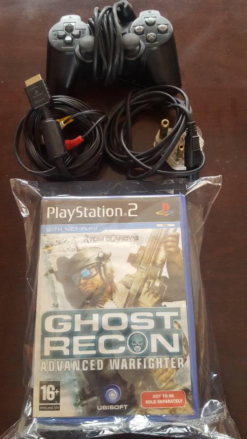 PS2 (Slim-Line) + 1 Controller + Cables + 2 Games