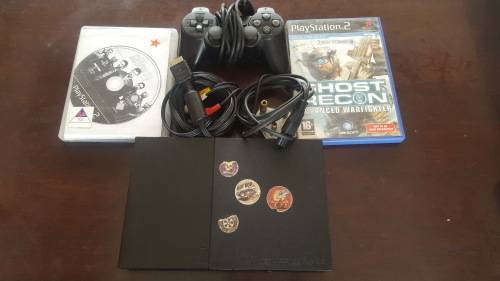 PS2 (Slim-Line) + 1 Controller + Cables + 2 Games