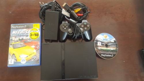 PS2 (Slim-Line) + 1 Controller + Cables + 2 Games