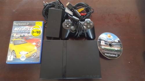 PS2 (Slim-Line) + 1 Controller + Cables + 2 Games