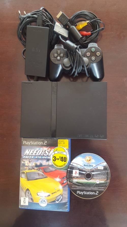 PS2 (Slim-Line) + 1 Controller + Cables + 2 Games