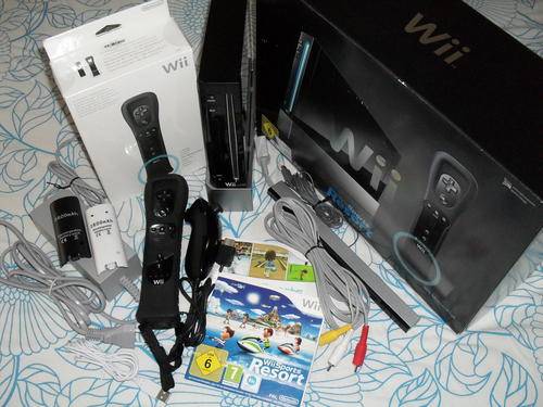 Nintendo Wii, 2 Controllers, Rechargable Battery Packs, Still under warranty..