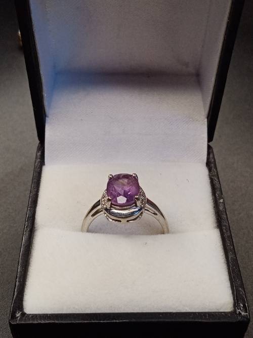 Ladies white gold with purple stone 17mm inside diameter  No Box!