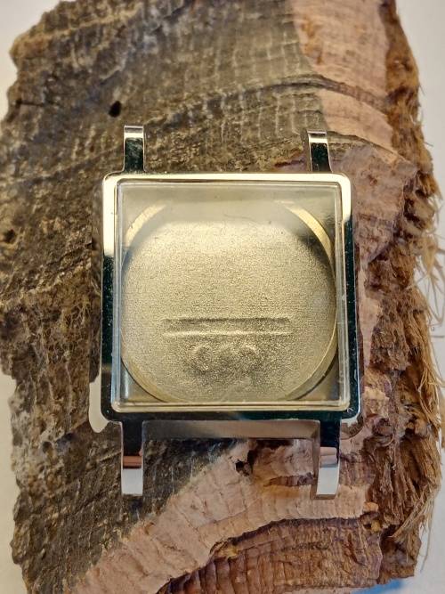 Square new old stock watch cases length: 22mm width: 23mm crystal intact