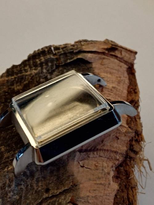 Square new old stock watch cases length: 22mm width: 23mm crystal intact