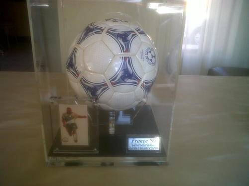 Nelson Mandela (Madiba) / Lucas Radebe signed France1998 World Cup soccer ball in a case and stand