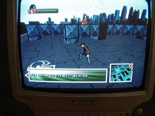 Ultimate Spider-Man PS2 disc and manual