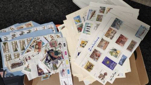 Shoe box full of stamps from all over the world