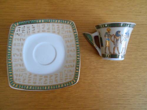 Highly decorated Egytian themed demi-tasse cup and saucer - Limoges