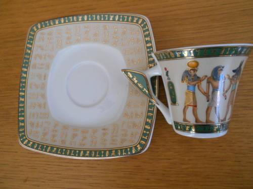 Highly decorated Egytian themed demi-tasse cup and saucer - Limoges