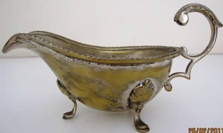 Heavy Silver plated gravy boat ...in need of restoration