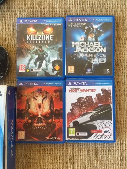 PS VITA 3G & WIFI ,16GB + 4GB MEMORY CARD, 4 GAMES INCLUDED, EARPHONES IN ORIGINAL BOX
