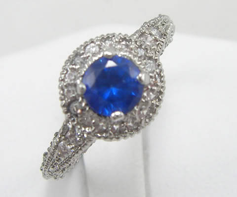 9K SOLID WHITE GOLD BLUE AND WHITE SAPPHIRE RING!! 1.350CTS!