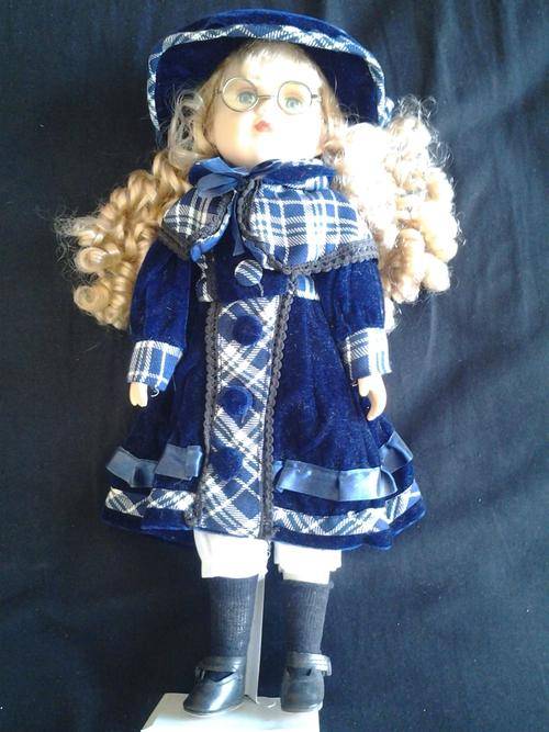 Doll with glasses