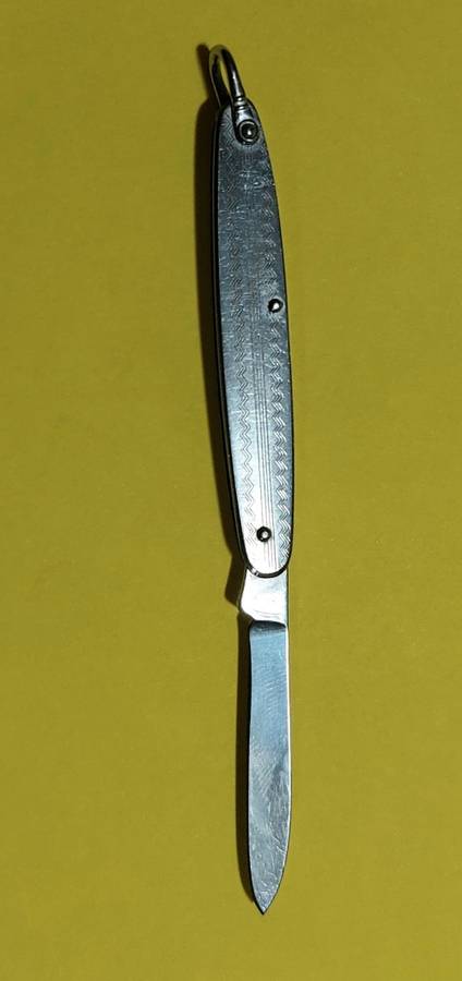 Silver-coloured Metal Pocket Knife