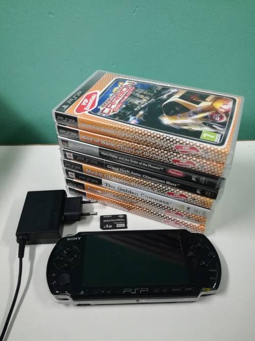 PSP + Charger + Memory Card + Games