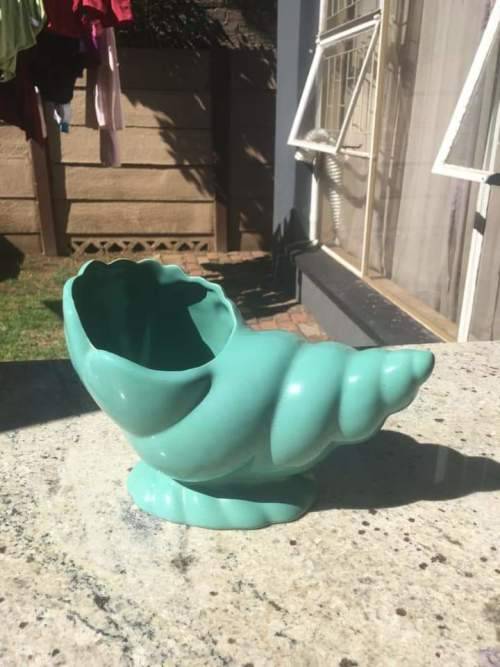 Lucia ware shell flower vase in mint condition.