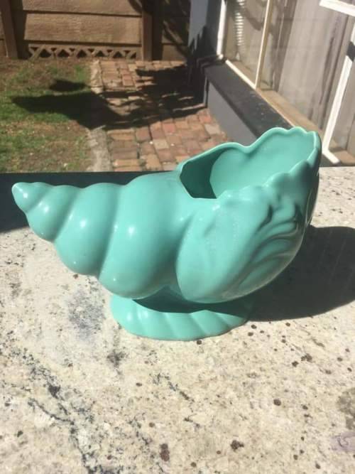 Lucia ware shell flower vase in mint condition.