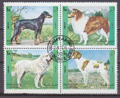 SHEET OF 4 BEAUTIFUL THEMATIC STAMPS -  DOGS -  SHARJAH UAE