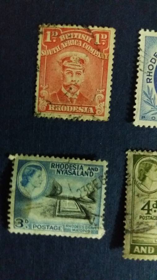 Rhodesia & Nyasaland  King George 1922 1d & Queen Elizabeth 1954 1d , 1959 3d & 4d.