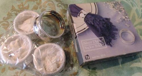 BRAND NEW SILVER PLATED NAPKIN RINGS STILL IN BOX