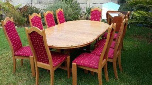 R E D U C E D ;High quality pure 1970's oak diningroom suite. Table extends. 10 upholstered chairs