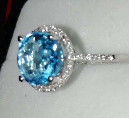 18ct white gold, Blue Topaz and Diamond ring