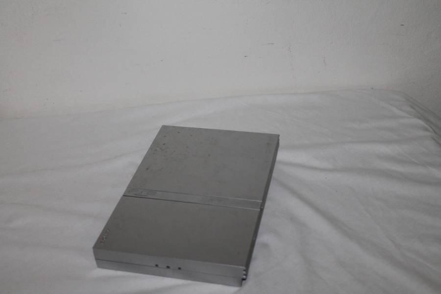 PlayStation 2  with 2 Controller`s, Memory Card, bag and manual
