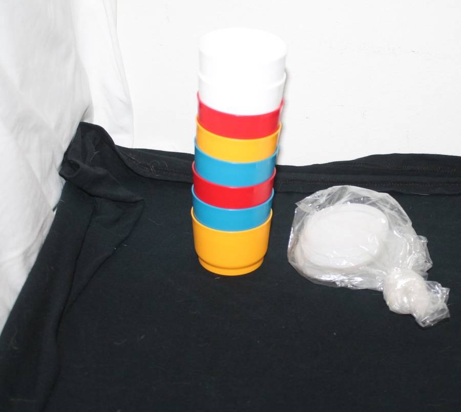 8 Small Tupperware containers