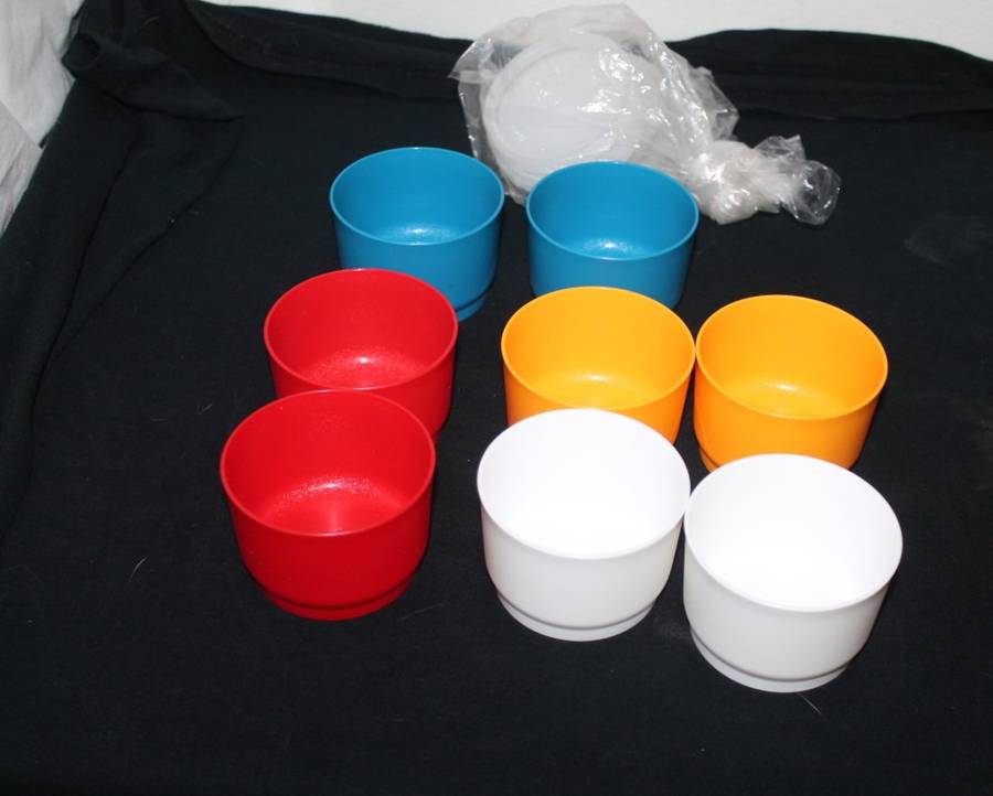 8 Small Tupperware containers