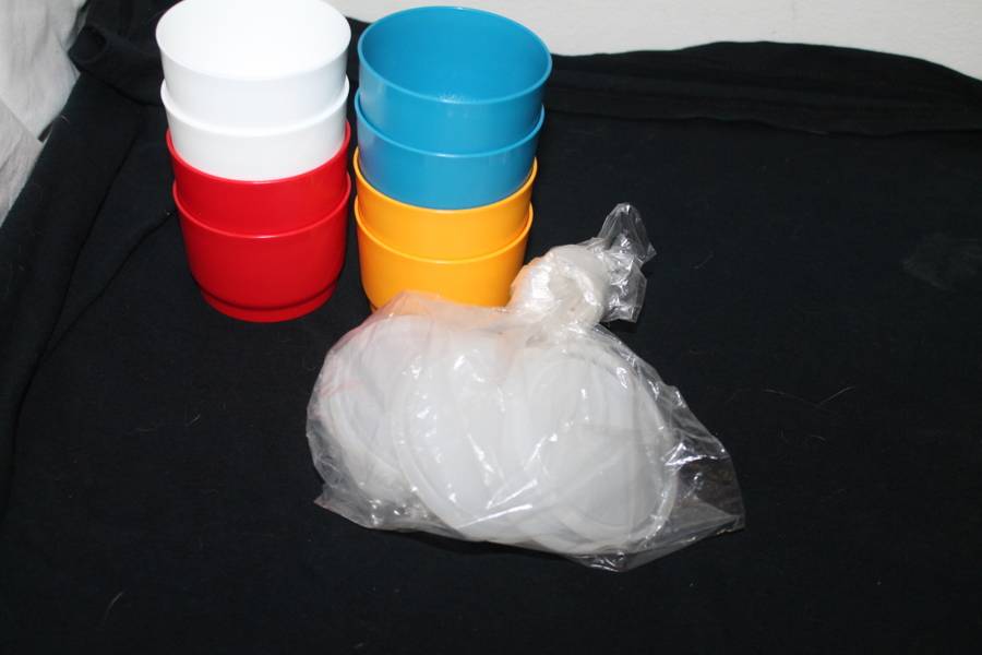 8 Small Tupperware containers