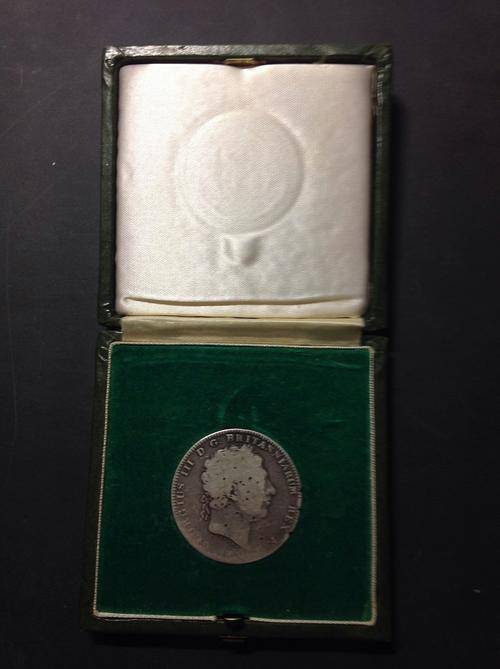 1820 BRITISH SILVER CROWN. WORTH $80 IN WORSE CONDITION. WITH A COIN BOX