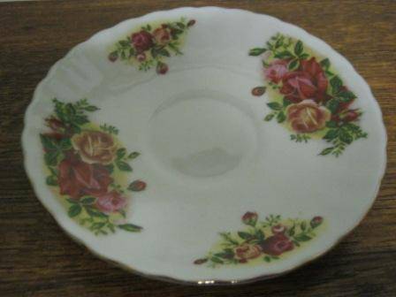 SAUCER WITH  ROSE DESIGN ~~ HAVE A LOOK!!!!