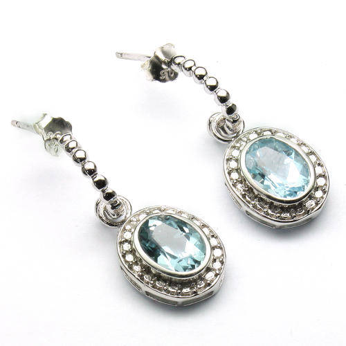 CHARMING 6X8 MM BLUE TOPAZ &  WHITE DIAMOND 0.925 STERLING SILVER W/ PLATINUM EARRINGS