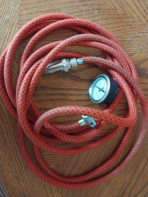 Emergency spark plug Tyre inflator