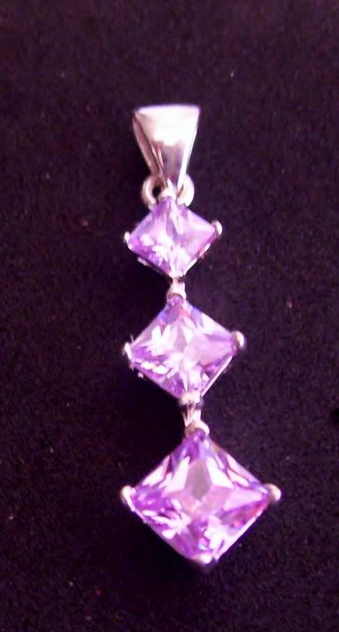 Unusual light lilac Simulated Diamonds pendant set in Sterling Silver