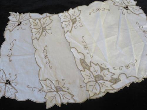 Three hand embroidered doilies
