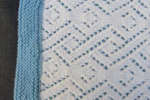 Knitted baby cot blanket - blue and white