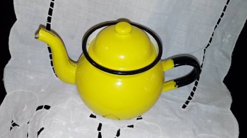 Yellow enamel teapot made in Poland - good condition - 13cm high.