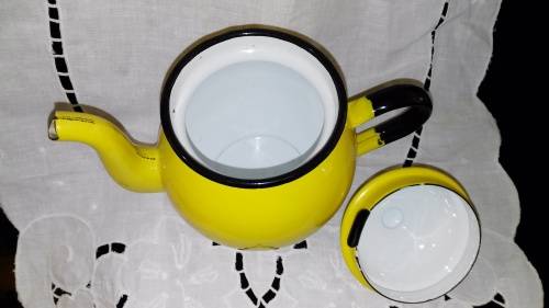 Yellow enamel teapot made in Poland - good condition - 13cm high.