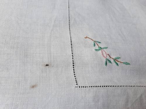 Embroidered tablecloth - white linen with pastel flowers - damaged - 102 x 102cm