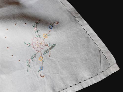 Embroidered tablecloth - white linen with pastel flowers - damaged - 102 x 102cm