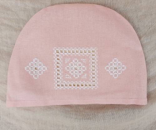 Pink tea cosy with hardanger needlework