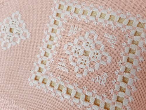 Pink tea cosy with hardanger needlework