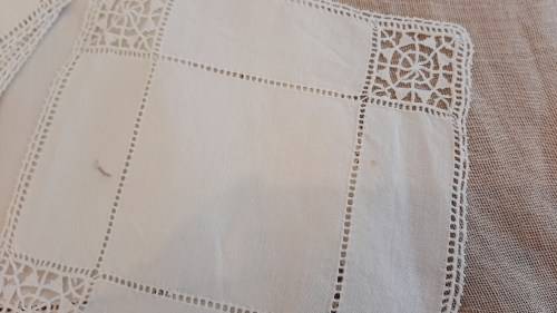 Set of reticella lace and linen mats