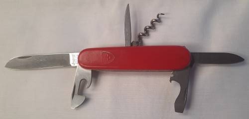 Vintage Elinox -Spartan  Swiss Army Knife With Red Scales Main blade has been reshaped on the tip