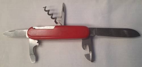 Vintage Elinox -Spartan  Swiss Army Knife With Red Scales Main blade has been reshaped on the tip
