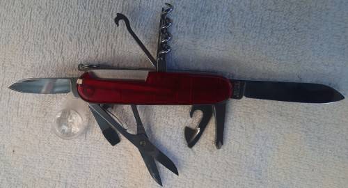 Victorinox -Explorer with red Translucent Scales tools as per pictures