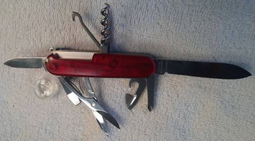 Victorinox -Explorer with red Translucent Scales tools as per pictures