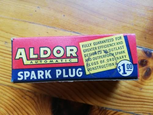 VINTAGE USED ALDOR SPARK PLUG IN BOX.  With original wax proof paper wrapper